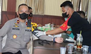 Personil Polres Muarojambi di Booster