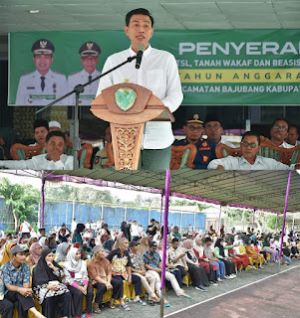 Bupati Mhd Fadhil Arif Serahkan Sertifikat PTSL Di Kecamatan Bajubang