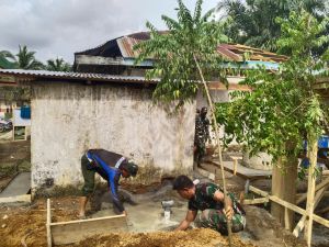 Satgas TMMD 123 Tuntaskan Pengecoran Septic Tank MCK Madrasah Nurul Falah