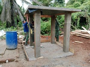 Satgas TMMD Buka Papan Mal Lantai Tower MCK Madrasah Nurul Falah