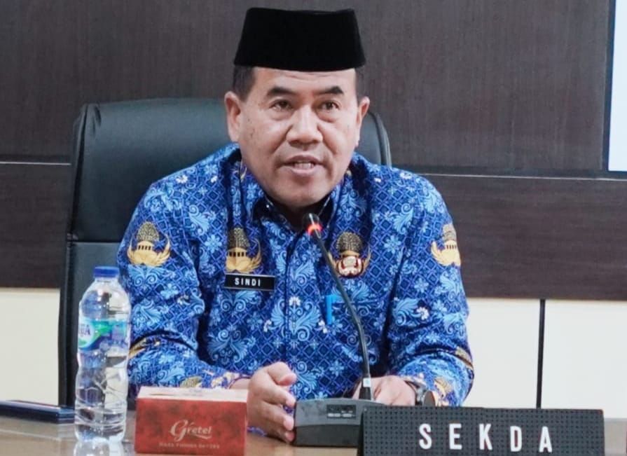 Pj Sekda Tebo, Sindi, saat menyampaikan rencana tablig akbar pada malam pergantian tahun 2025–2026.