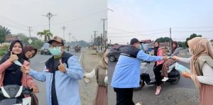 Peduli Kabut Asap, BKPRMI Tebo Bagikan Masker Gratis kepada Masyarakat